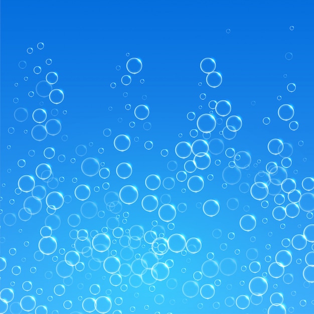 青い水の背景上向きに浮かぶ泡