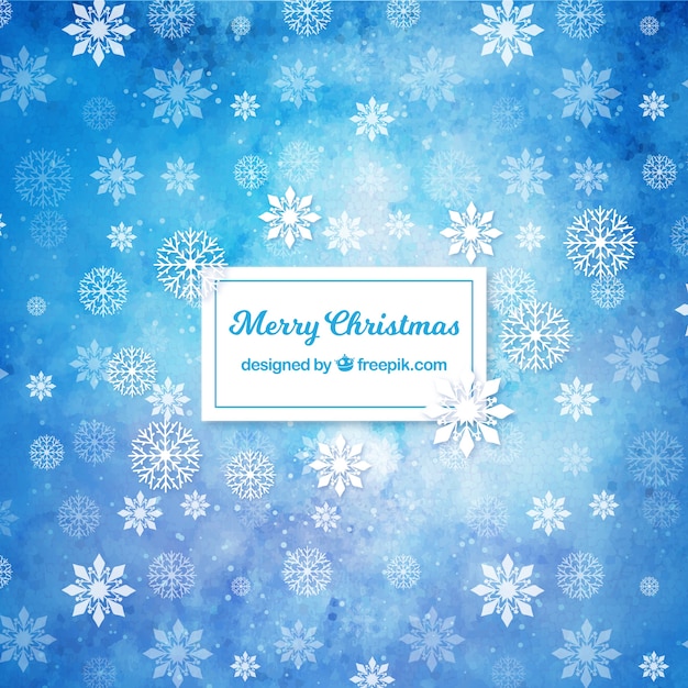 Free vector blue watercolor background with snowflakes