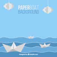 Free vector blue and white background with paper boats