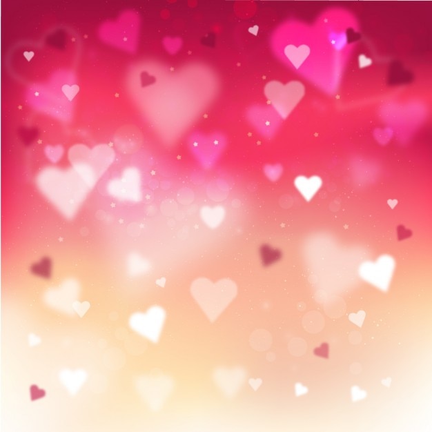 Free vector blurred background with hearts