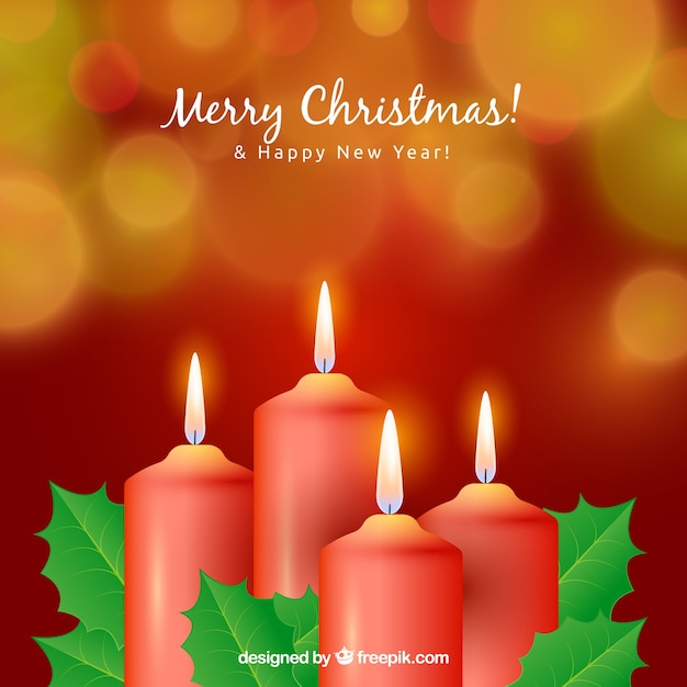 Free vector blurred christmas background with four red candles