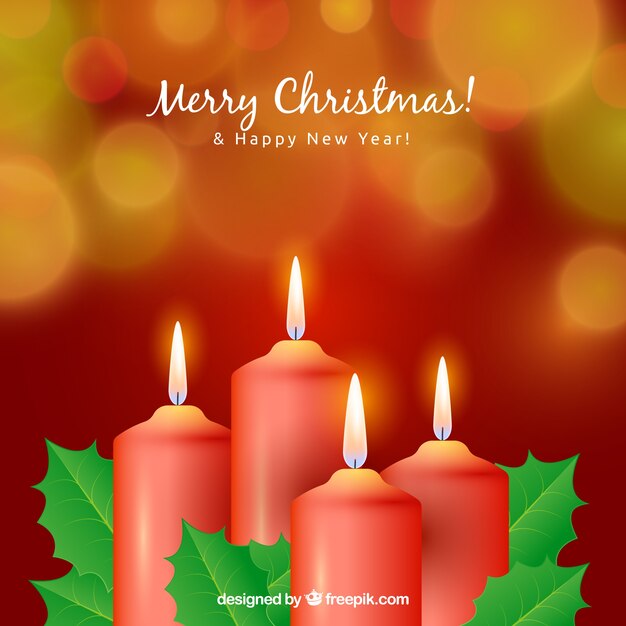 Blurred christmas background with four red candles