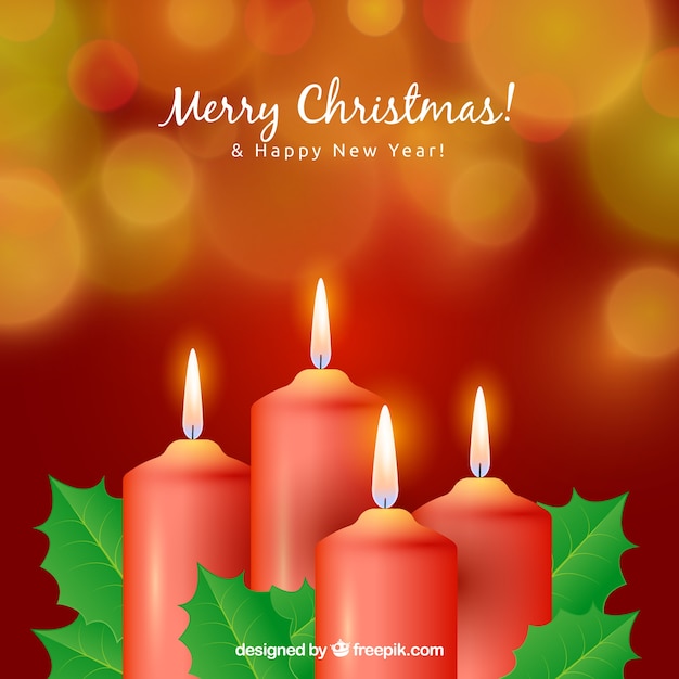 4つの赤い蝋燭とぼんやりとしたクリスマスの背景