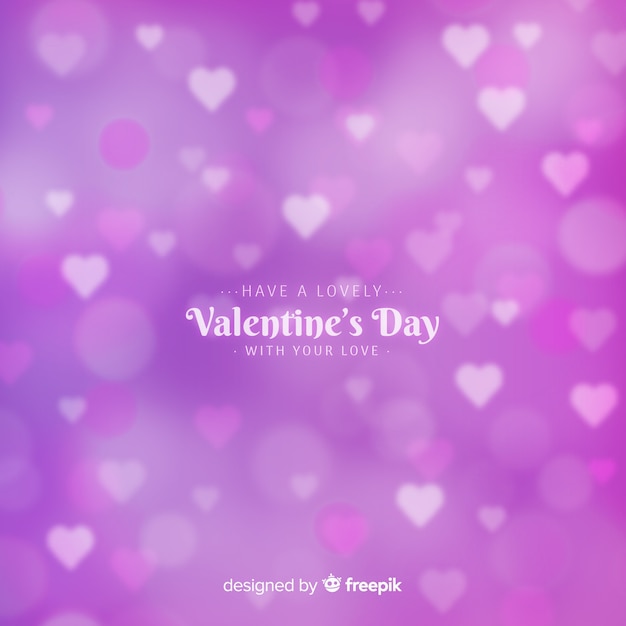 Free vector blurred hearts valentine's day background