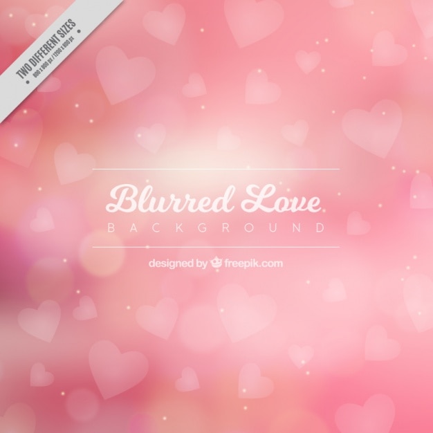 Blurred love background with pink hearts