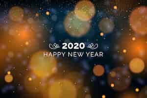 Vettore gratuito sfocato sullo sfondo del nuovo anno 2020