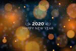 Vettore gratuito sfocato sullo sfondo del nuovo anno 2020