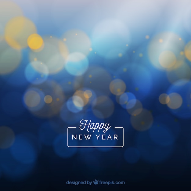 Free vector blurred new year background in blue