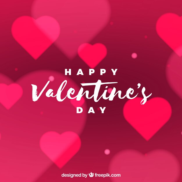 Blurred valentine's day background with bright hearts