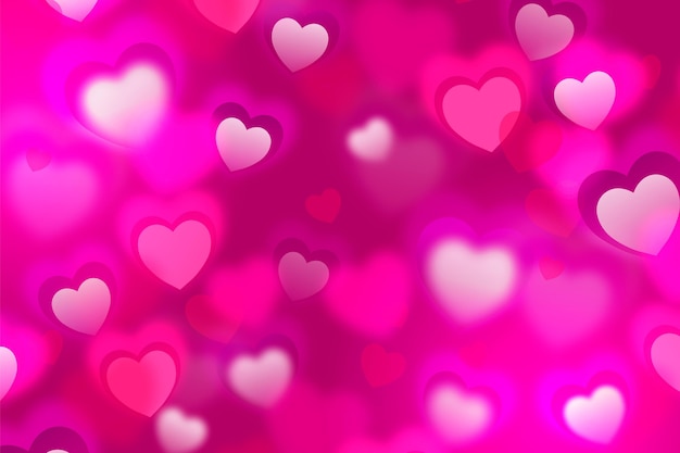 Free vector blurred valentine's day wallpaper with hearts