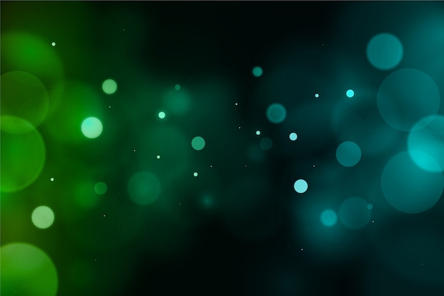 Free vector blurry green bokeh glare background