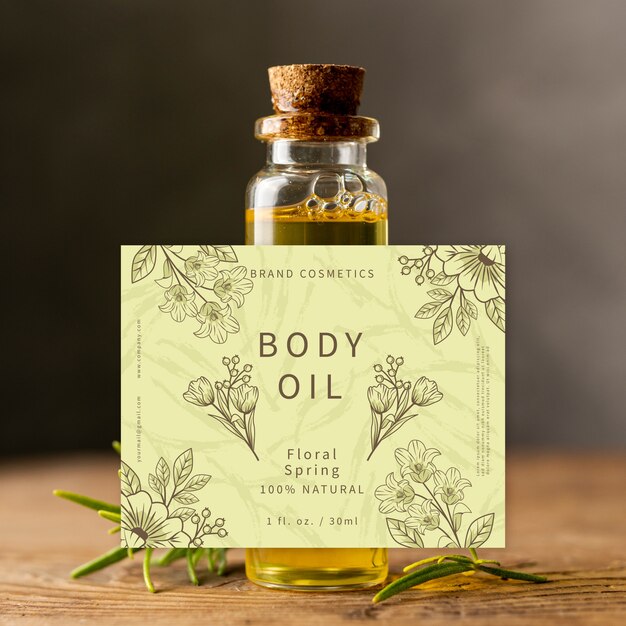 Body oil in small glass bottle ad