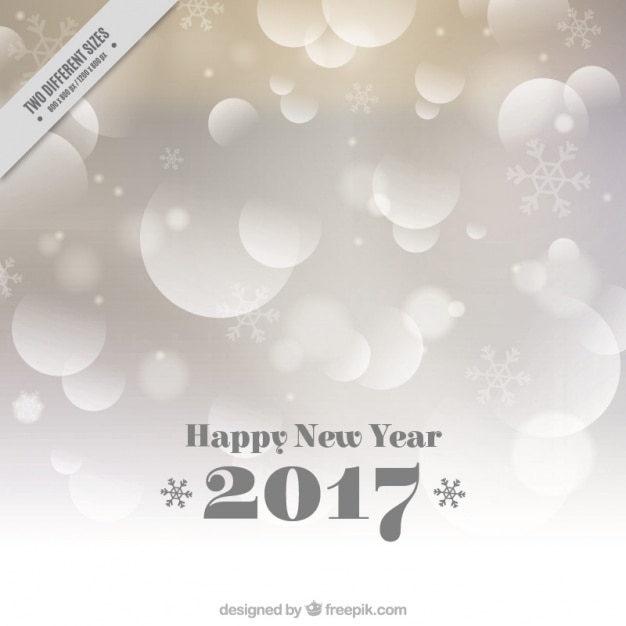 Free vector bokeh background for new year with snowflakes