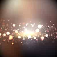 Free vector bokeh background with golden lights