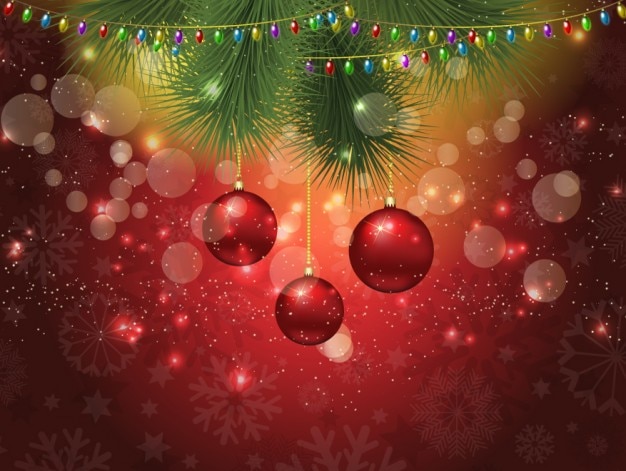 Free vector bokeh christmas background with christmas decorations