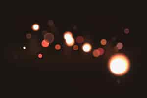 Free vector bokeh effect on dark background