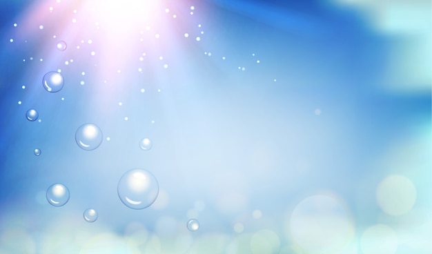 Bokeh and lens flare on light blue sky background.