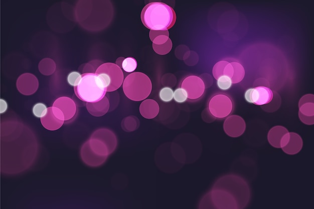 Free vector bokeh lights effect on dark background