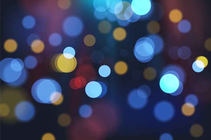 Free Vector bokeh lights effect on dark background