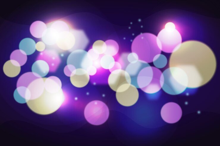 Free Vector bokeh lights effect on dark wallpaper design