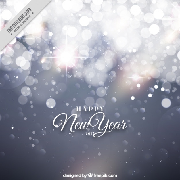 Free vector bokeh new year background with shiny shapes