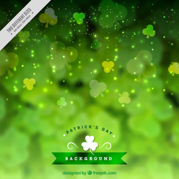 Free vector bokeh st patrick's day background with decorative clovers