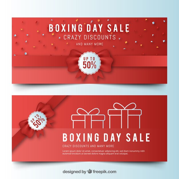 Boxing day sale banners with red ribbon