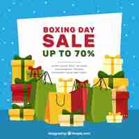 Free vector boxing day sales background with gifts