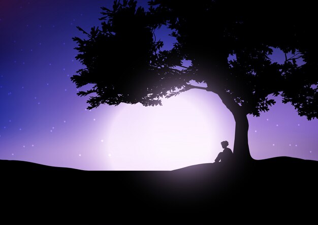 Мальчик сидит против дерева против ночного неба