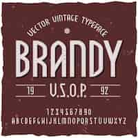 Free vector brandy background with vintage typeface label with editable ornate text and  letters  illustration