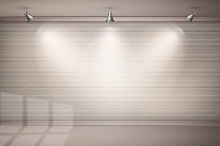 Free Vector brick wall with spot lights wallpaper theme