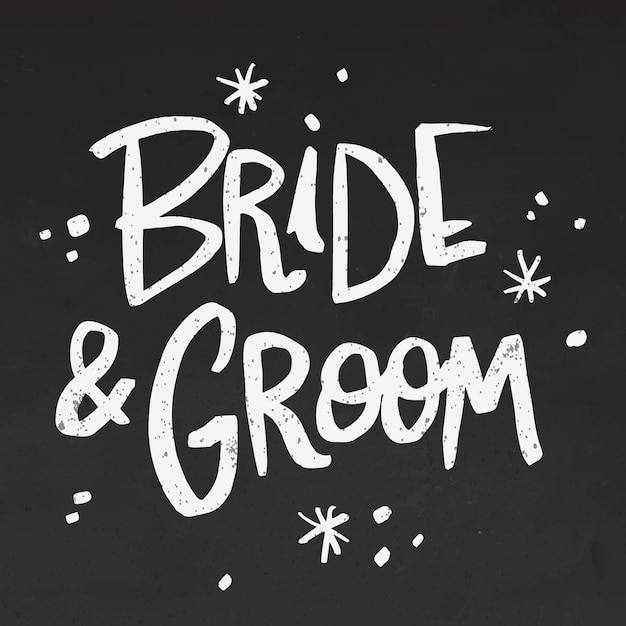 Bride and groom lettering on blackboard