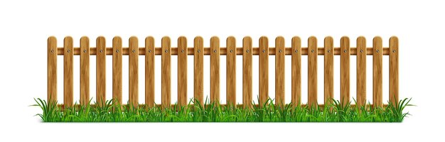 Brown wooden picket fence with green grass