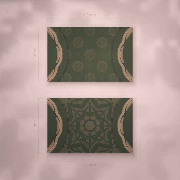 Business card in green with indian brown ornaments for your business.