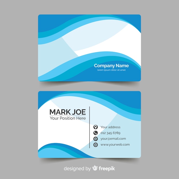 Free vector business card template with abstract shapes