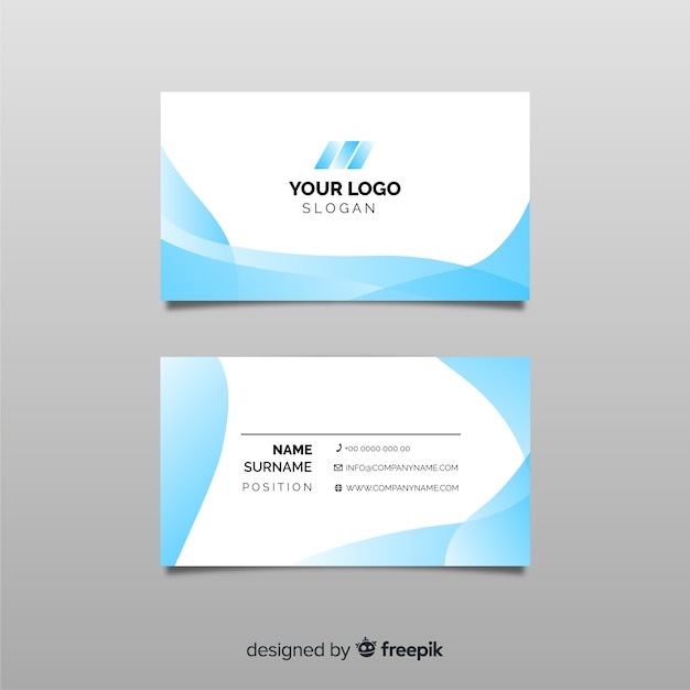 Free vector business card template with abstract shapes