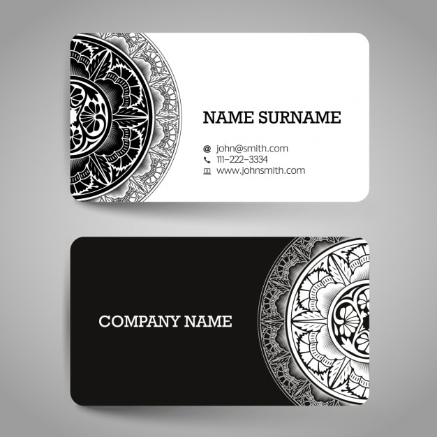 Free vector business card with black and white ornamental elements