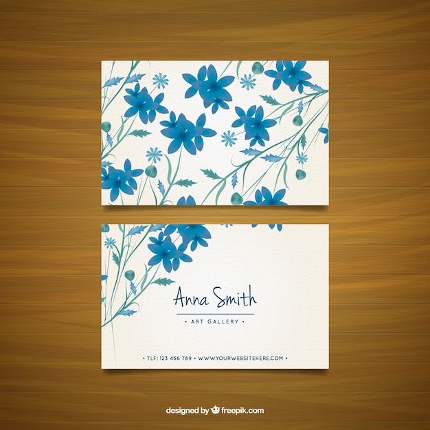 Business card with blue flowers