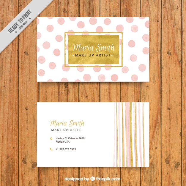 Business card with decorative dots and lines