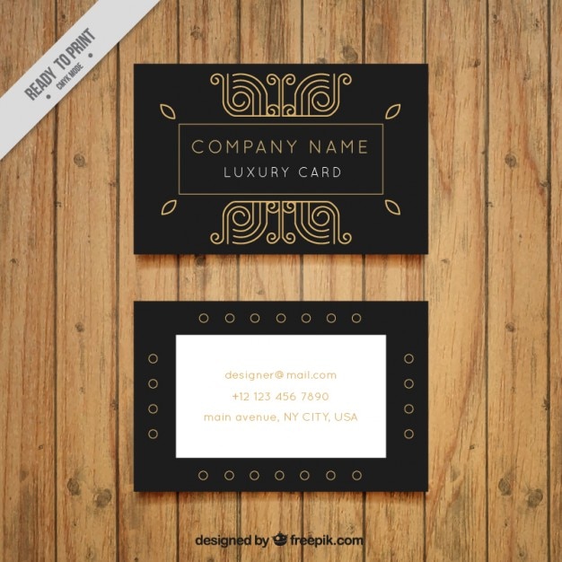 Free vector business card with golden ornaments