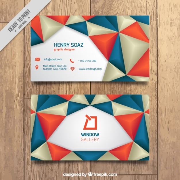 Free vector business card with red and blue triangles