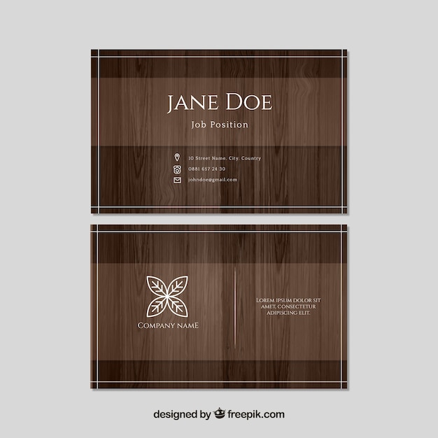 Free vector business cards with wood effect