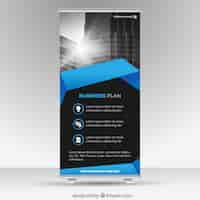 Free vector business roll up with blue shapes