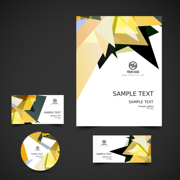 Free vector business stationery with abstract shapes