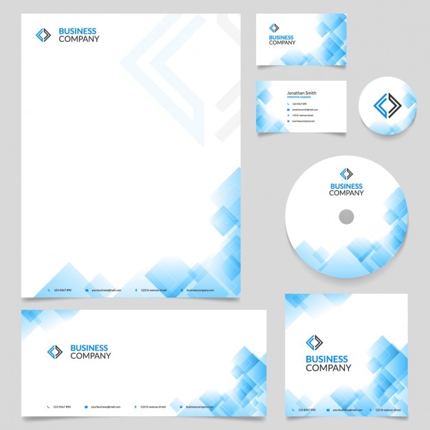 Free Vector business stationery with blue geometric shapes