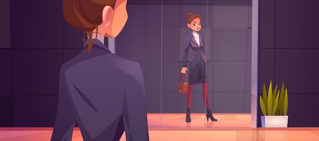 Business woman looking at her reflection in mirror