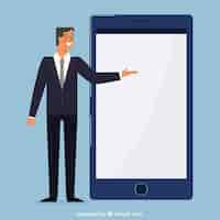 Free vector businessman pointing at a mobile screen