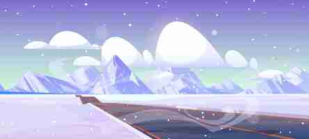 Free vector car road to mountains on snow valley in winter. vector cartoon illustration of landscape with empty asphalt highway, white rocks on horizon, snowfall and clouds in sky