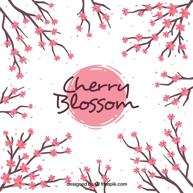 Free vector cherry blossom background in hand drawn style