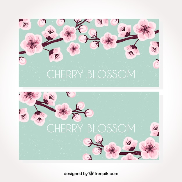 Free vector cherry blossom banners in flat style